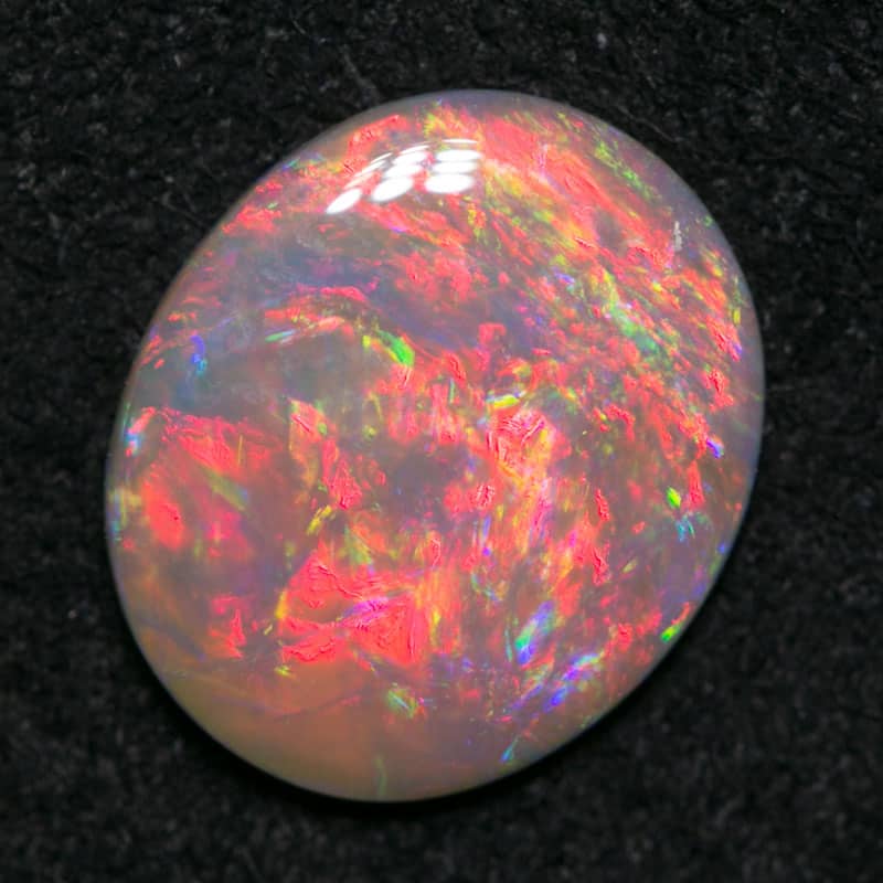 1.06 ct dark opal 10x8.5x1.5mm