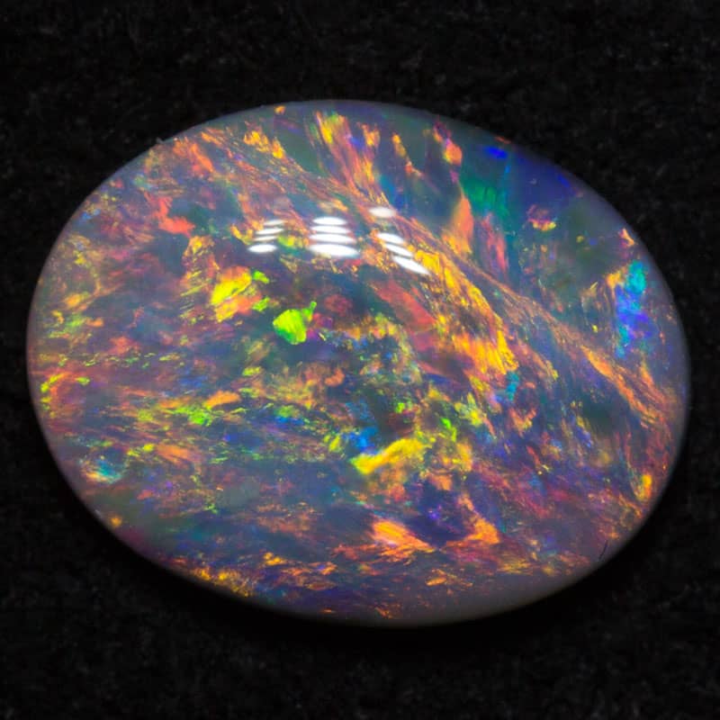 1.06 ct dark opal 9.5x7.5x2.5mm