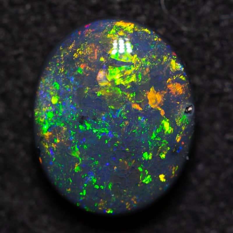 1.07 ct black opal 7.5x6x3mm