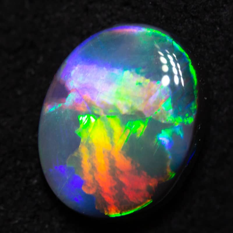 1.07 ct black opal 8.3x6.6x2.9mm