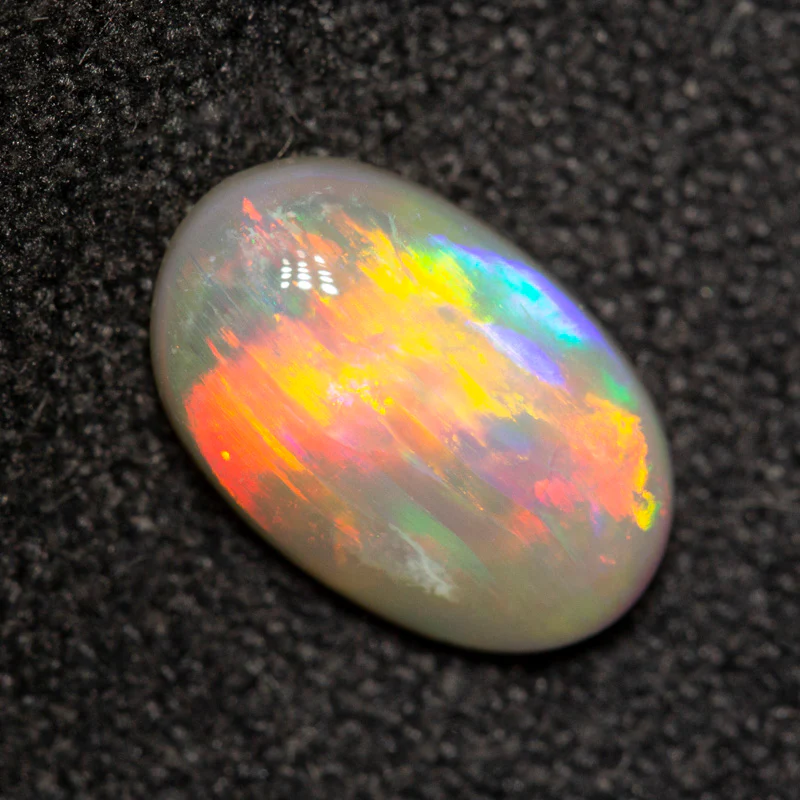 1.08 ct dark opal 9.3x6.1x3.1mm