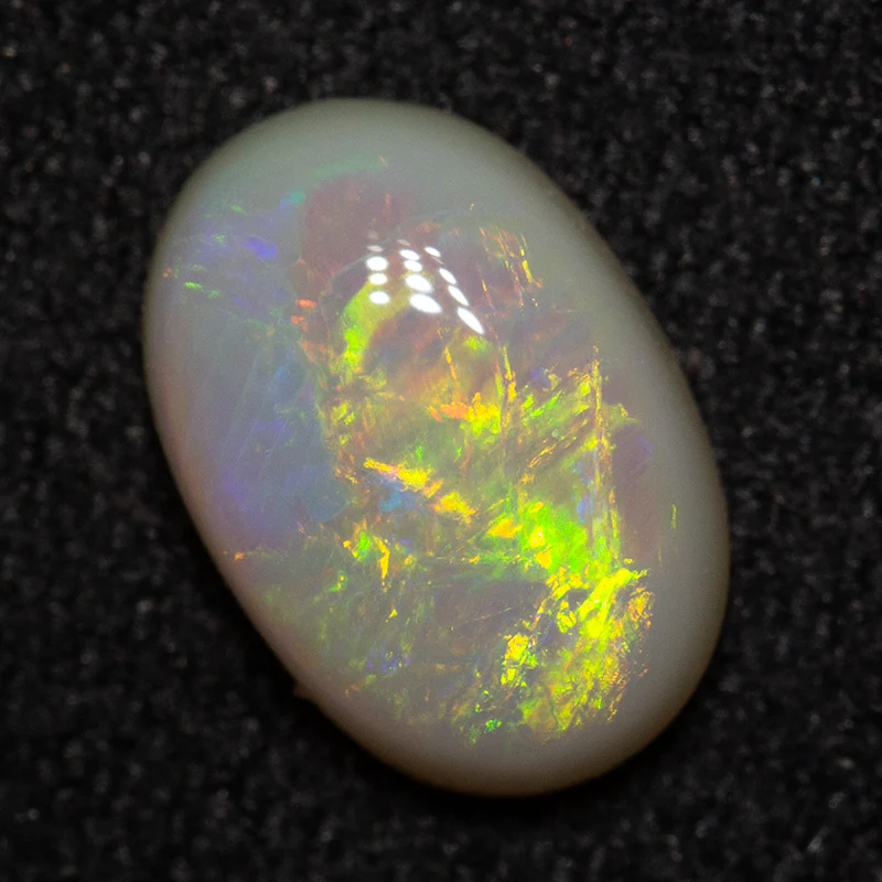 1.08 ct white opal 8.7x6x3mm