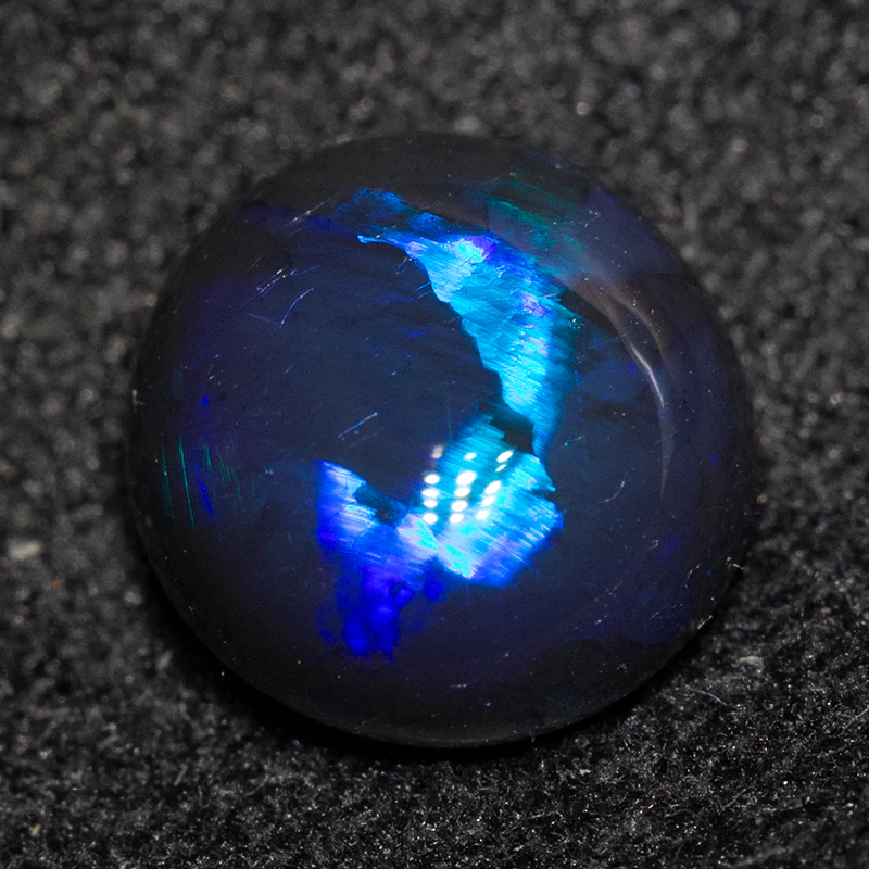 1.09 ct black opal 7.2x6.8x3.2mm