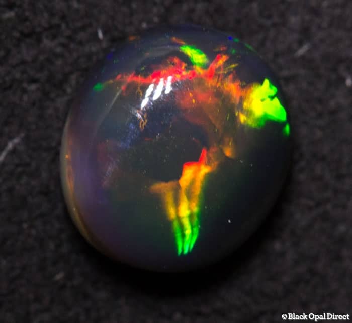1.09 ct black opal 7.5x6.5x4mm