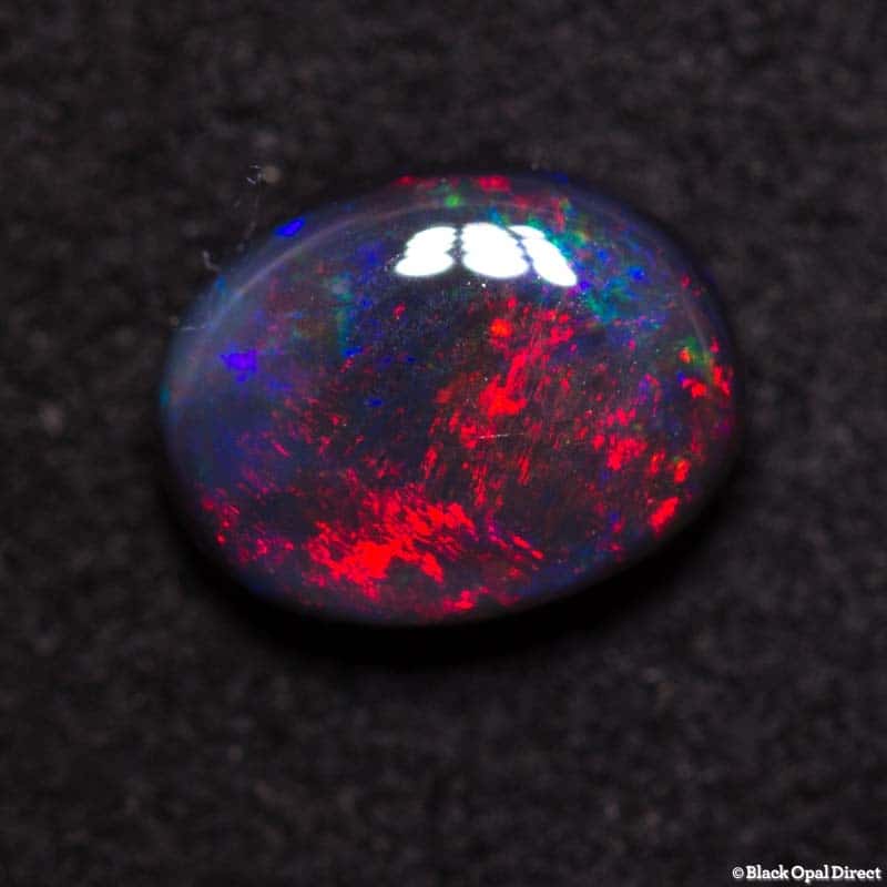 1.09 ct black opal 7.5x6x3mm