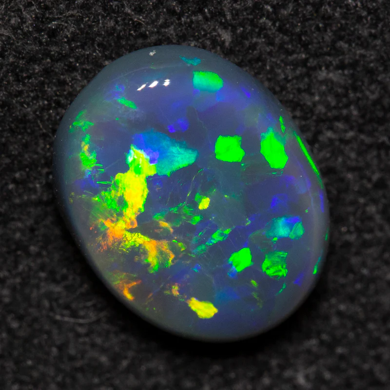 1.09 ct black opal 8.3x6.5x2.9mm