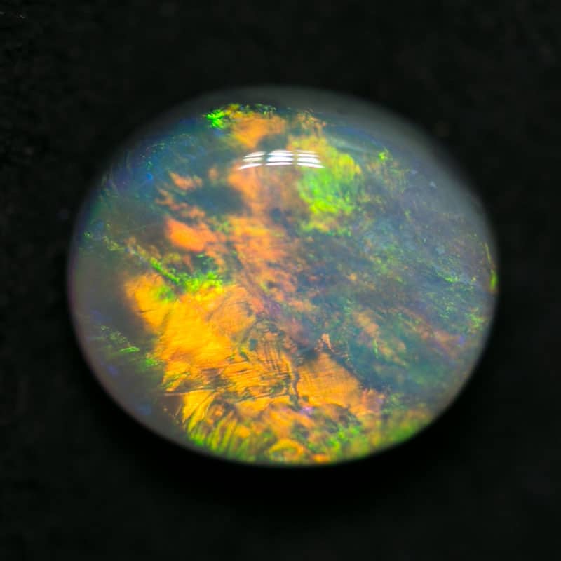 1.09 ct dark opal 7x6x3.5mm