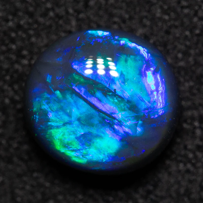 1.10 ct black opal 6.9x6.6x3.9mm