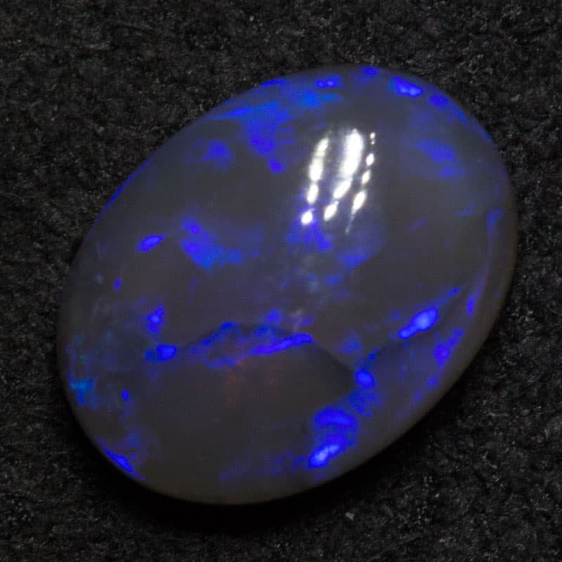 1.10 ct black opal 7.9x5.9x3.6mm