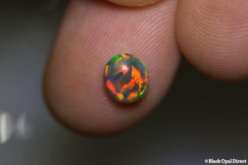 1.10 ct gem black opal 7x6.5x3.5mm