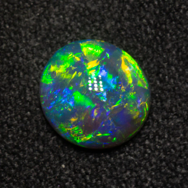 1.11 ct black crystal opal 7.6x7.1x3.3mm