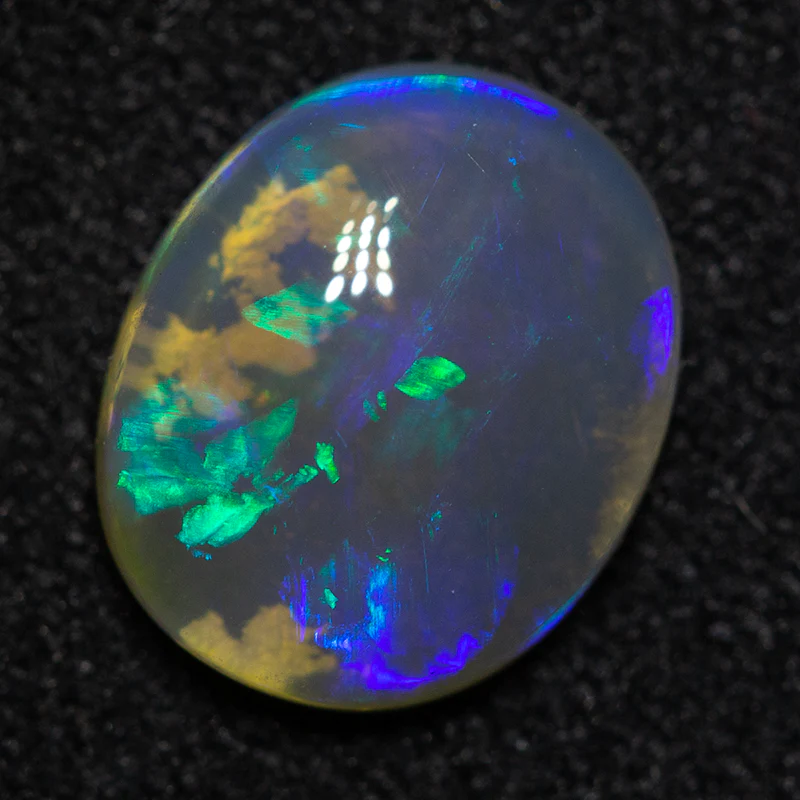 1.11 ct black crystal opal 8.8x7.3x2.9mm