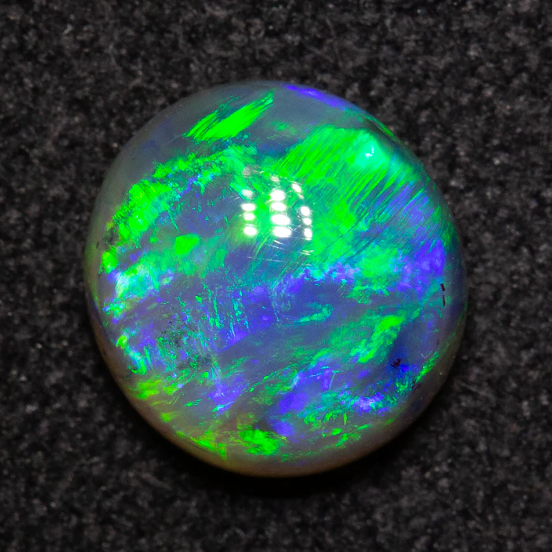 1.11 ct dark crystal opal 7.4x7x3.6mm