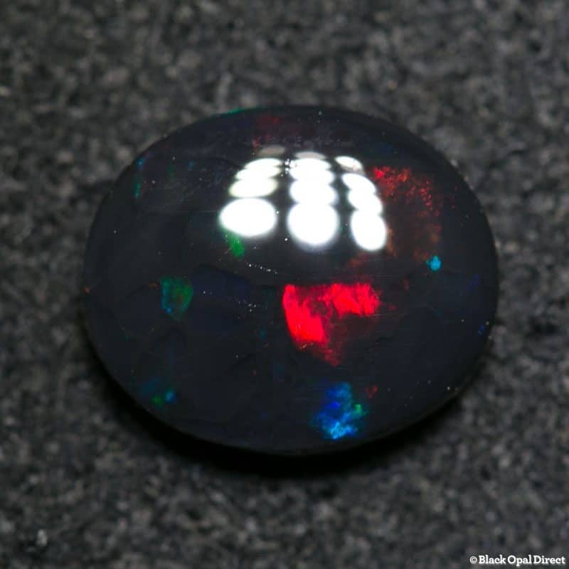 1.12 ct black opal 8x7x2.5mm
