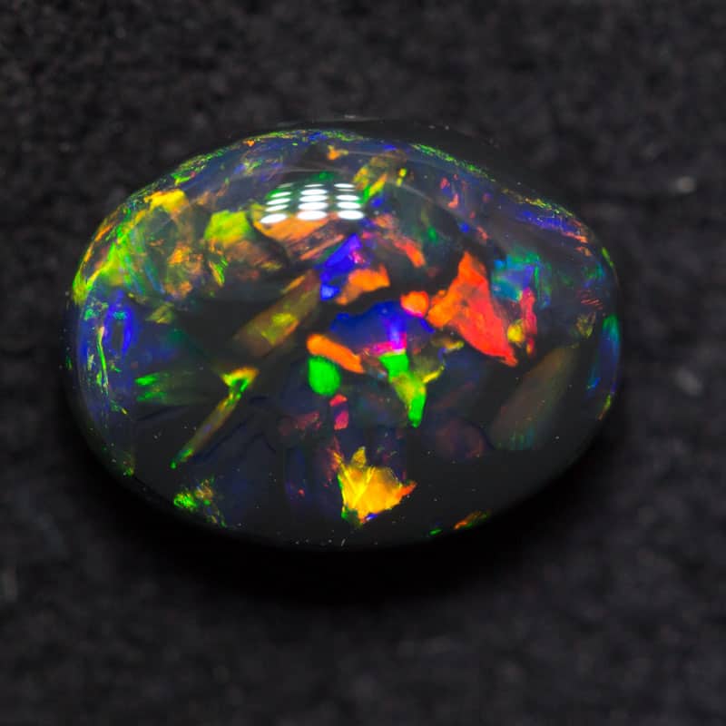 1.12 ct black opal gem 8.5x6x4mm