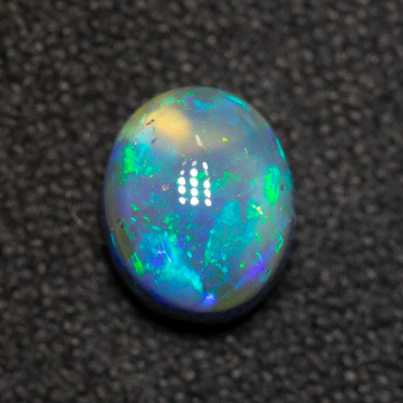 1.13 ct black opal 7x5.8x4.7mm