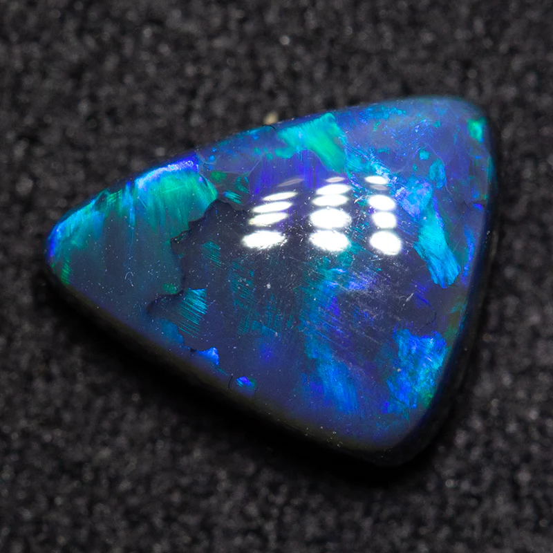 1.13 ct black opal 8.5x6.6x3.9mm