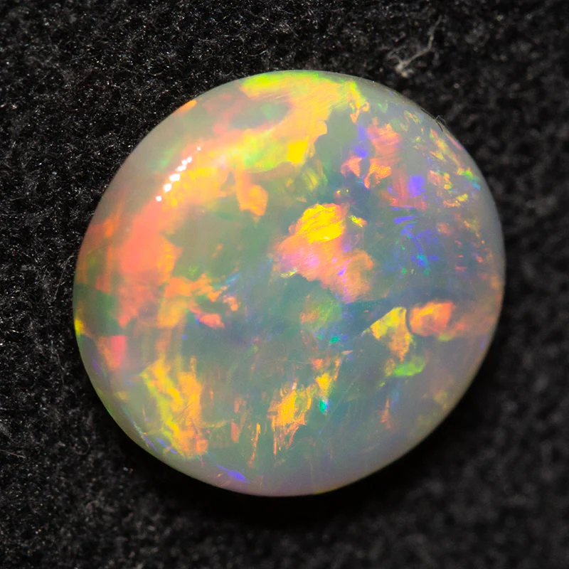 1.13 ct dark opal 8.5x7.8x2.8mm