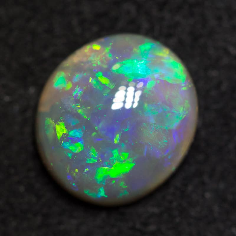 1.13 ct dark opal 8x7x3mm