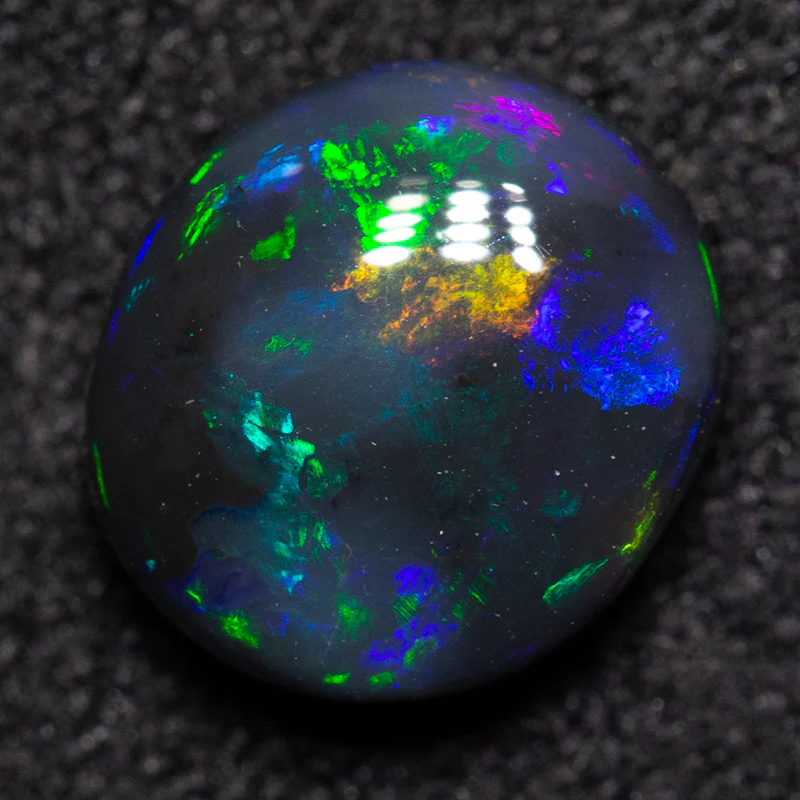 1.14 ct black opal 7.5x6.8x3.3mm