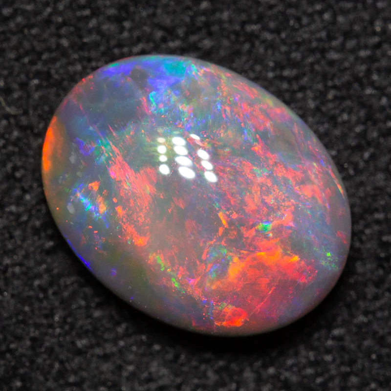 1.15 ct dark opal 8.8x6.8x3.2mm