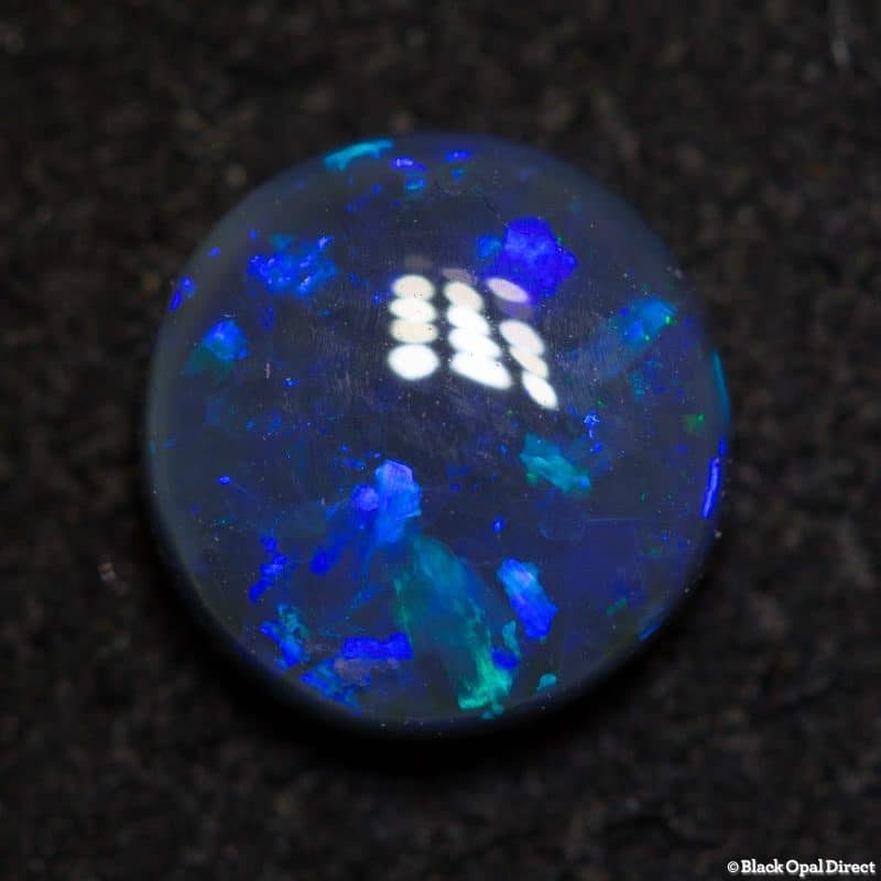 1.16 ct black opal 7mm round x3mm thick
