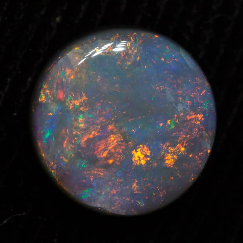 1.16 ct dark opal 7.9x7.7x2.8mm