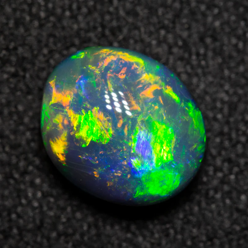 1.18 ct black opal 7.5x6.3x4.2mm