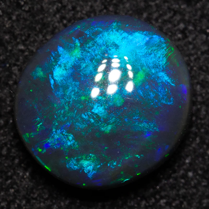 1.18 ct black opal 7.8x7.3x3.4mm