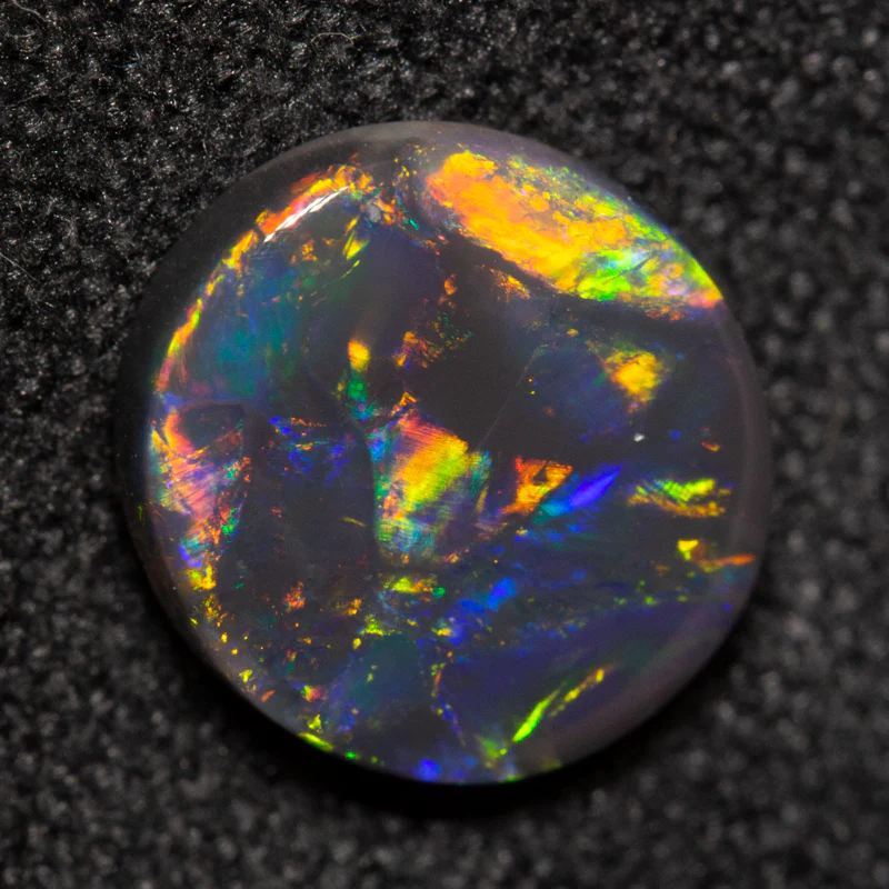 1.18 ct black opal 8.3x7.7x2.5mm