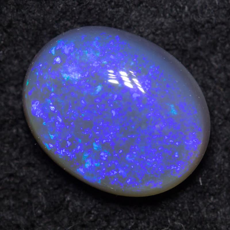 1.21 ct black crystal opal 8.3x6.6x3.5mm