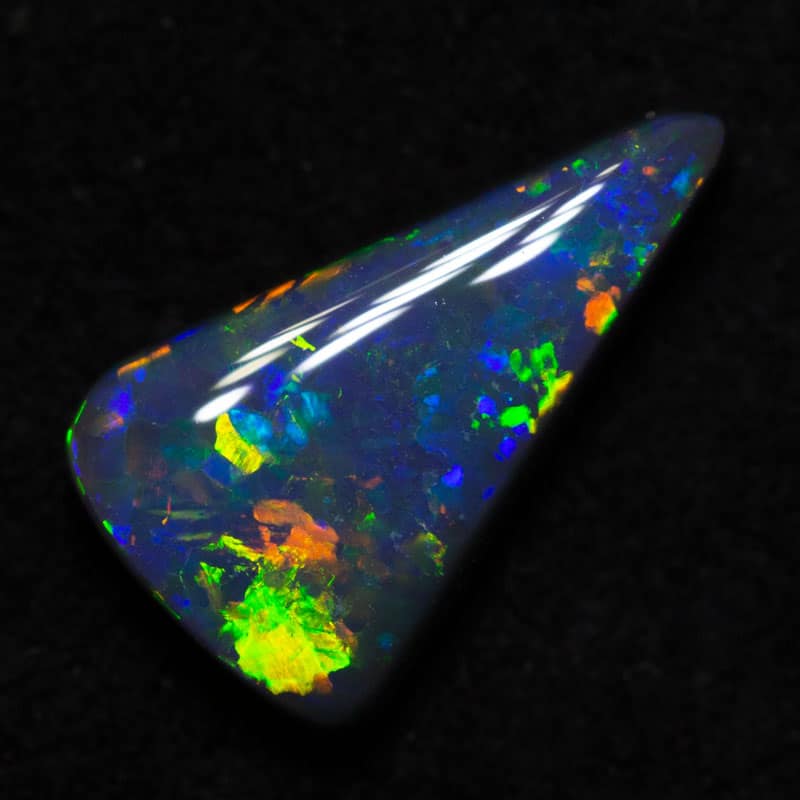 1.22 ct black opal 10.9x6.4x3mm DEPOSIT