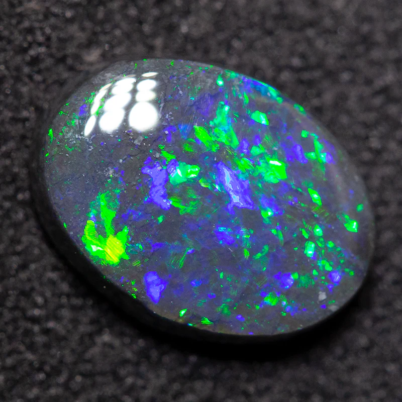 1.23 ct black opal 9.2x6.8x2.8mm