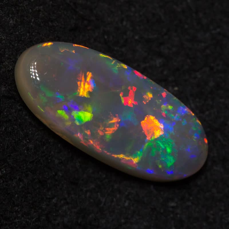 1.23 ct dark opal 11.8x5.1x3mm