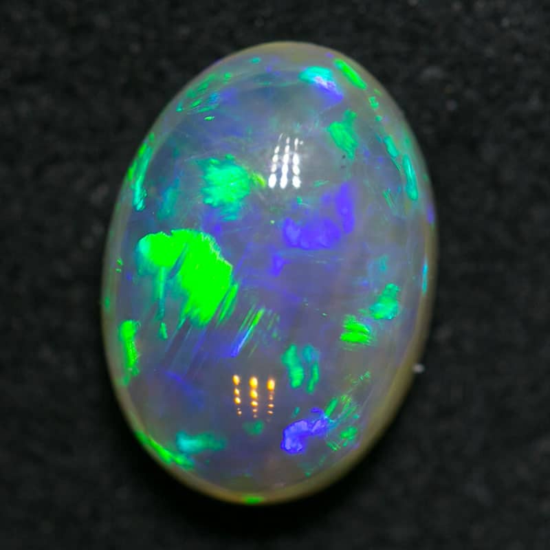 1.23 ct double sided crystal opal 8.5x6x3mm - Image 3