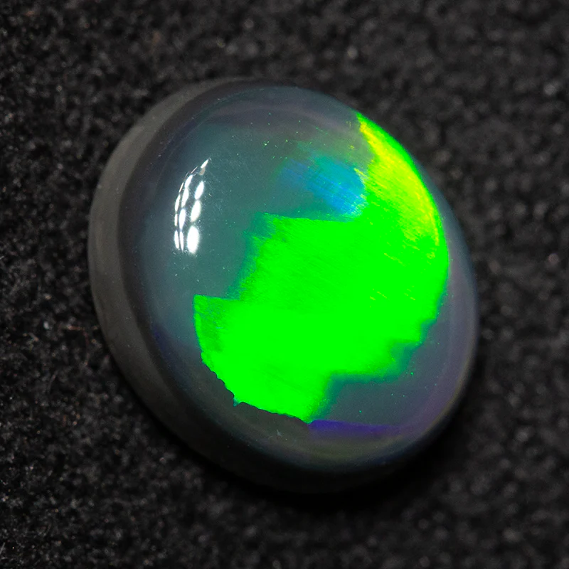 1.24 ct black opal 7.9x6.6x3.6mm