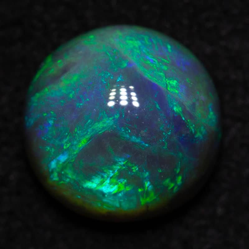1.25 ct black opal 7x7x4.3mm