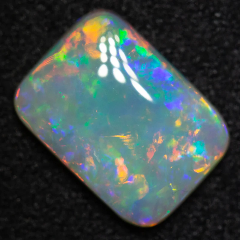 1.25 ct dark opal 9.5x6.9x2.4mm