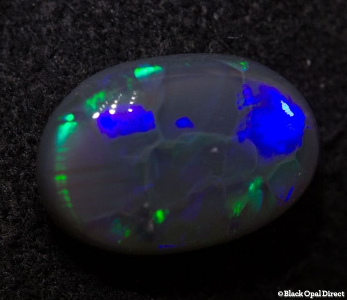 1.25 ct semi black opal 9x6x3mm
