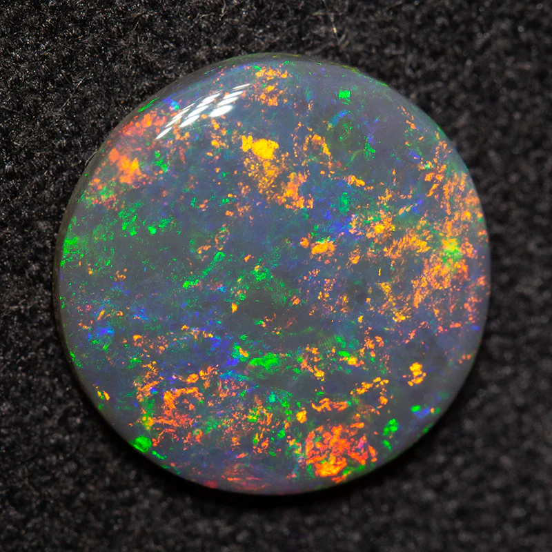 1.26 ct black opal 9.5x9.4x2.1mm