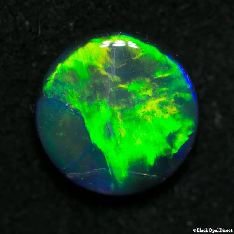 1.27 ct black opal 8mm round x 3mm