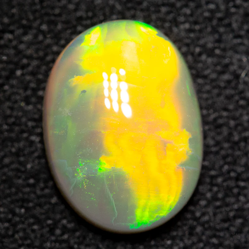 1.27 ct dark opal 9.5x7x3mm