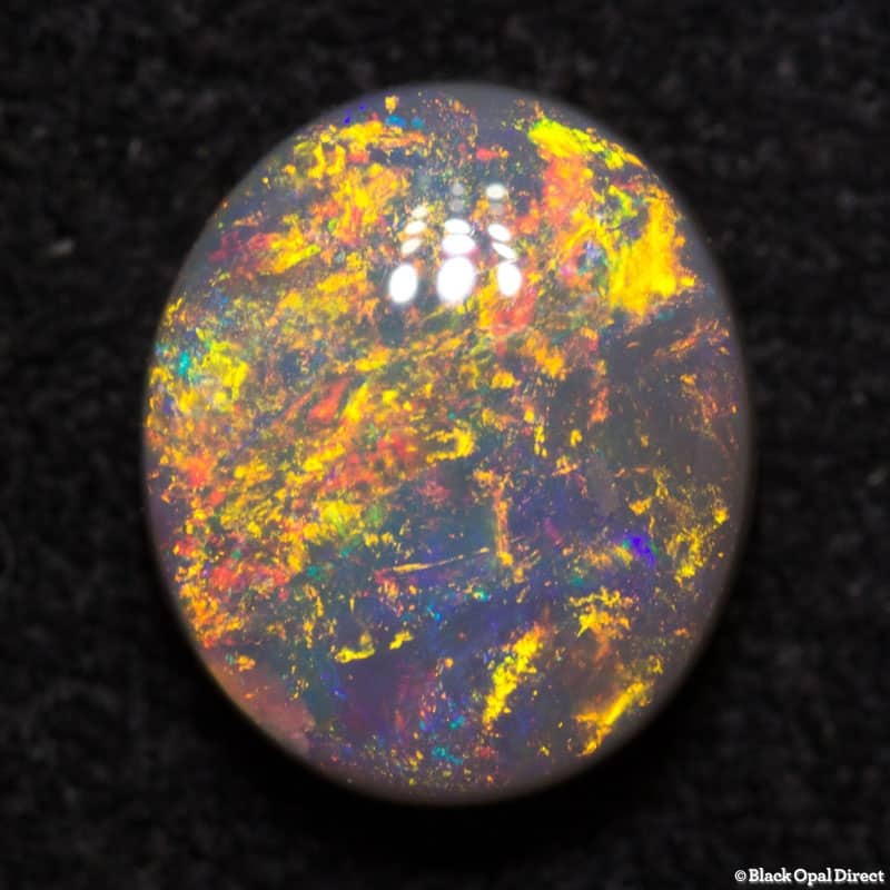 1.27 ct semi black opal 8x7x3.5mm
