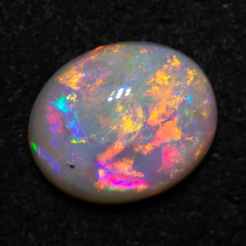 1.27 ct white opal 8x7x3.5mm