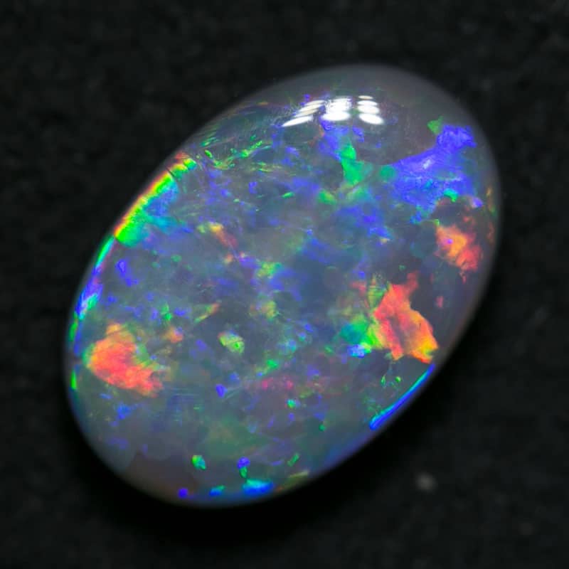 1.28 ct dark opal 9x6x3mm