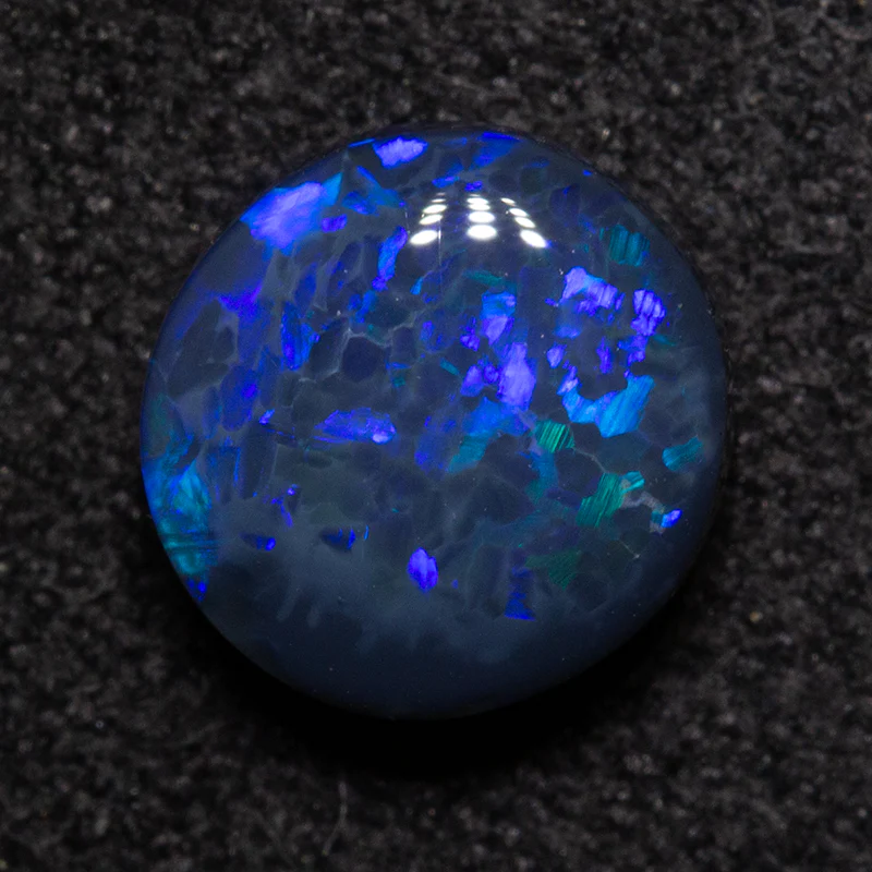 1.30 ct black opal 7.3x7.1x3.6mm