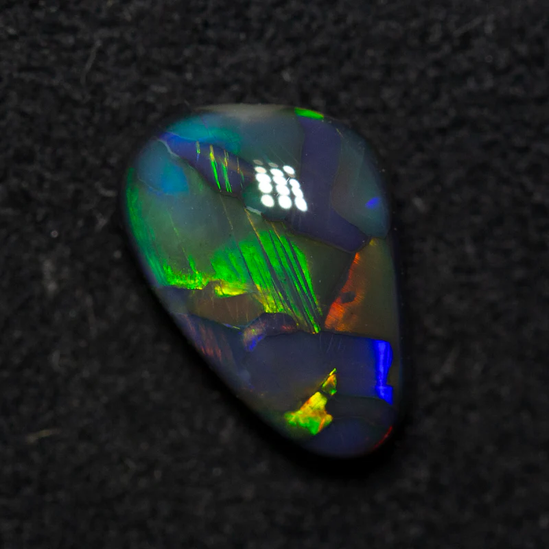 1.30 ct black opal 9.8x6.6x3.8mm
