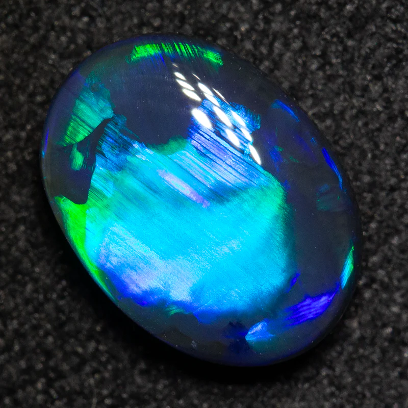 1.31 ct black opal 9x6.7x3.4mm