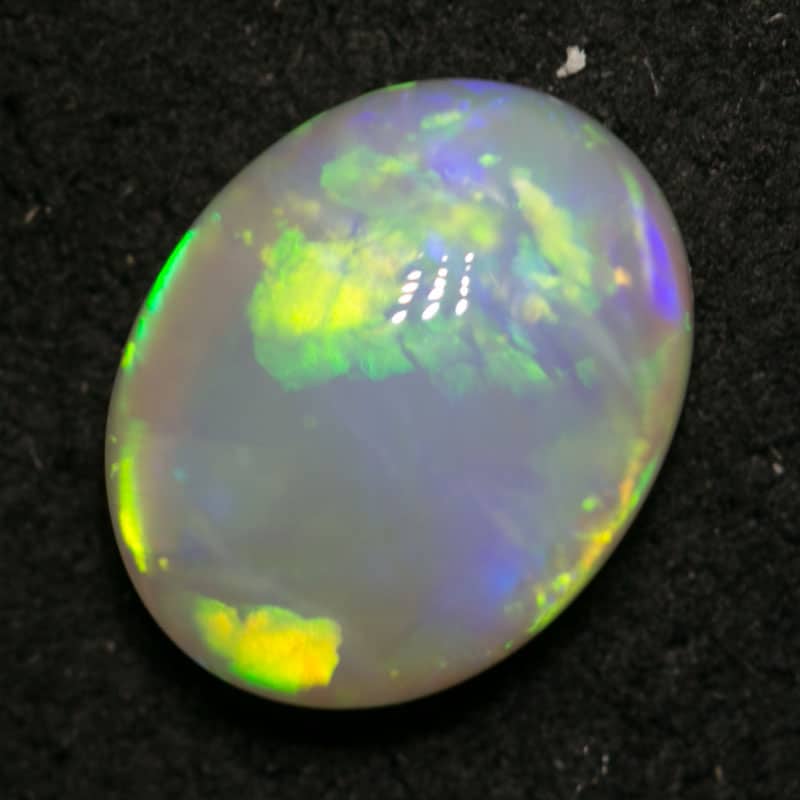 1.31 ct white opal 8x6.5x3mm