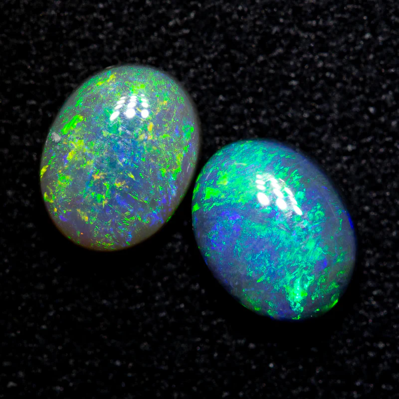 1.36 ct black opal pair 6.5x5.1x3mm